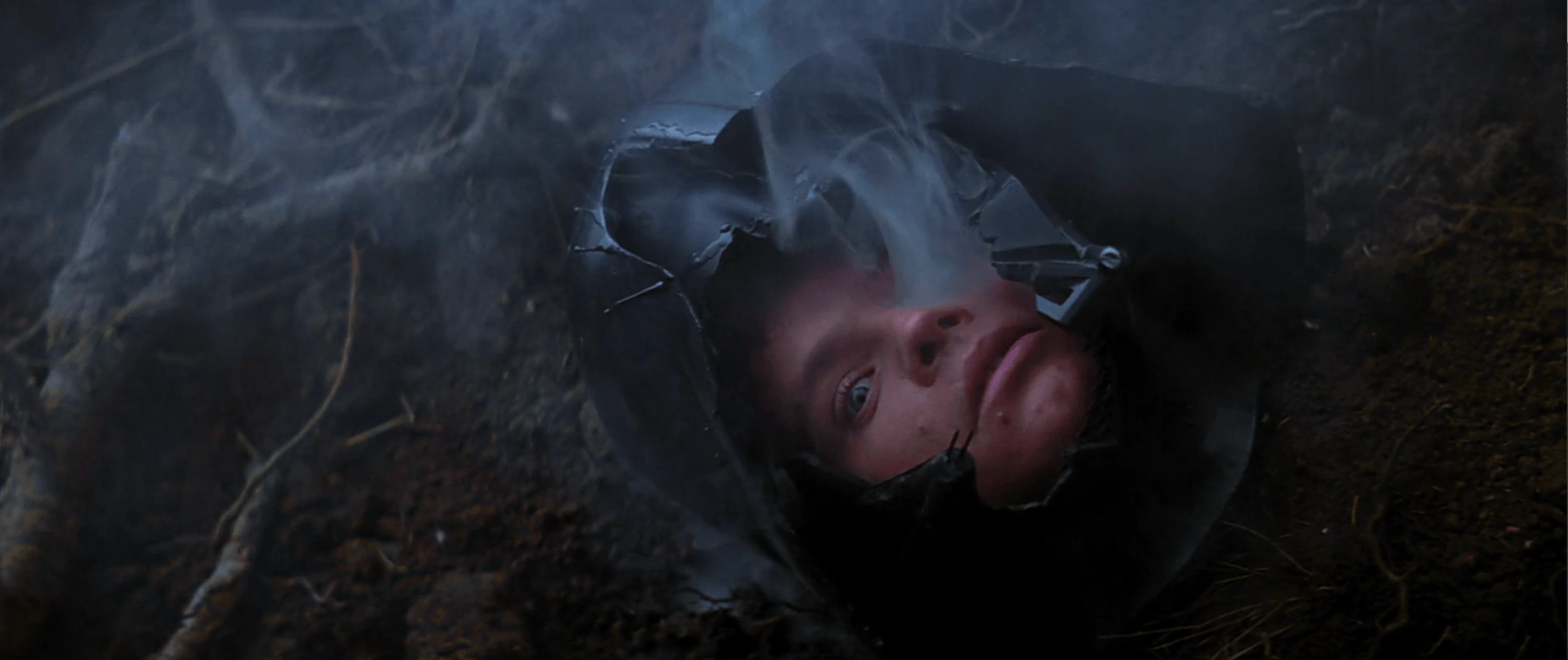 Vader's mask falls, and Luke's face appears behind it
